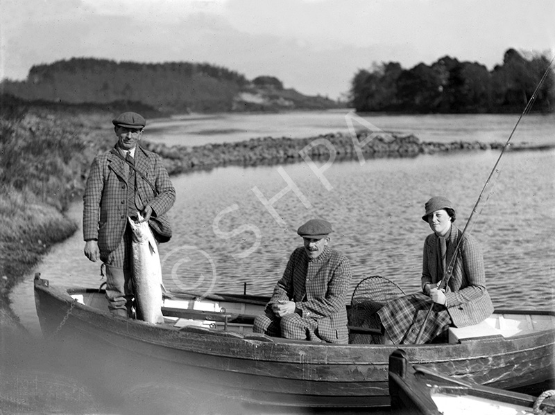Unidentified celebrity people salmon fishing at Dochgarroch. *