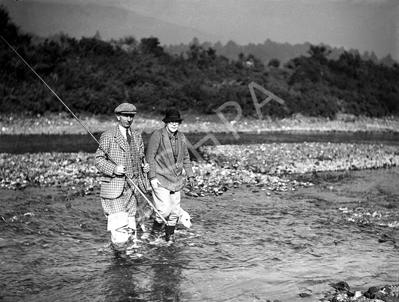 Unidentified celebrity people salmon fishing at Dochgarroch. *