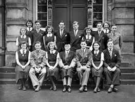 Inverness Royal Academy Prefects 1948-1949. Rear: Peggy MacLeod, Margaret MacLennan, Roderick A. MacLeod, Peggy Fraser, Stanley Fleming, James MacKenzie, Deirdre Munro, Frank Taylor, Aileen Munro, Ross Martin. Front: Erica Donald, Scott Moffatt (VC), Aileen Barr (C), Rector D.J MacDonald, Allan Cameron (C), Lorna Menzies (VC), Angus MacKenzie. See also IRAA_045.