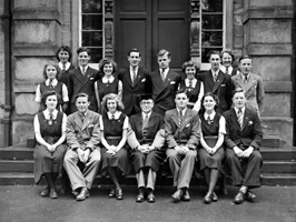 Inverness Royal Academy Prefects 1948-1949. Rear: Peggy MacLeod, Margaret MacLennan, Roderick A. MacLeod, Peggy Fraser, Stanley Fleming, James MacKenzie, Deirdre Munro, Frank Taylor, Aileen Munro, Ross Martin. Front: Erica Donald, Scott Moffatt (VC), Aileen Barr (C), Rector D.J MacDonald, Allan Cameron (C), Lorna Menzies (VC), Angus MacKenzie. See also IRAA_045.