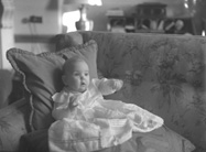 Baby on sofa, inscription 'Aldourie.' (Aldourie was the home of the Fraser-Tytler family). #