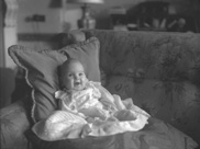 Baby on sofa, inscription 'Aldourie.' (Aldourie was the home of the Fraser-Tytler family). #