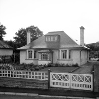 House called Roseville on Cromlet Drive, Invergordon, with a large fuel tank in the right background. *