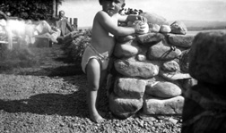 George Maclennan (1920-2001) on the beach at North Kessock c1924. He was a nephew of the famous photographer Andrew Paterson (1877-1948). In the background is Hector Paterson, son of Andrew Paterson. #