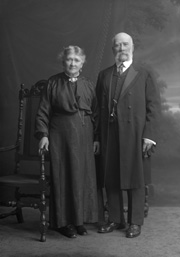 Senior couple, standing.#