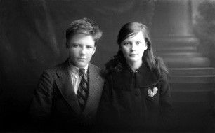 Miss Paterson, Kenneth Street, Inverness. The young man on the left is James Daniel Mackintosh (1905-1970), son of James Daniel Mackintosh (1867-1909) and Christina Christie (1877-1913). At right is his younger sister Maisie (1907-1920). After their parents died they were taken in at different times by several different relatives, including his mother's sister Anne, who had married Peter Paterson. James Daniel Mackintosh emigrated to the USA in 1923, after Maisie died in 1920. Peter Paterson was the brother of famous photographer Andrew Paterson (1877-1948), who also emigrated with wife Anne and daughter Dorothy in 1925.