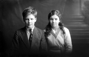 Miss Dorothy Paterson, Kenneth Street, Inverness. The young man on the left is James Daniel Mackintosh (1905-1970), son of James Daniel Mackintosh (1867-1909) and Christina Christie (1877-1913). When his parents died, he and his younger sister Maisie were taken in at different times by several different relatives, including his mother's sister Anne, who had married Peter Paterson. He is with the Paterson's adopted daughter Dorothy (1906-1967). James Daniel Mackintosh emigrated to the USA in 1923, after Maisie died in 1920. Peter Paterson was the brother of famous photographer Andrew Paterson (1877-1948), who also emigrated with wife Anne and daughter Dorothy in 1925. 