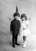 Boy and girl dressed in fancy dress, a pixie and a fairy, named under Mrs Allan Gilmour, Rhindnie, Lentran.