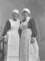 Miss Lowbridge, Drumnadrochit c.1923. Uncertain of identity. Lowbridge is the name on the envelope but photos A and B show these two separately without their uniforms. Either could be Lowbridge.    