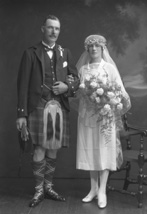 Bridal couple, groom in kilt.#