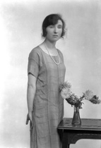Miss MacLean. She also features in group portrait 26158.