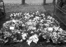 Unidentified cemetery. Floral tributes. *