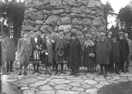 Tourist party at the Memorial Cairn on Culloden battlefield, c.1927.*