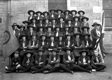 Inverness Royal Academy Girl Guide Company, photographed in 1927 for use in the school magazine published that June. The same photograph was later used in the People's Journal. At this time the Company Captain was Miss Mary Roy (geography teacher), and Miss Jessie Horne (art) had recently become Lieutenant. Weekly meetings were held in the school gymnasium. The Company was established in about 1923, and ran until the early 1940s. The flag reads: '3rd Inverness Royal Academy.' #