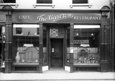 The Carlton Cafe, Inglis Street, Inverness, now occupied by Costa Coffee. The reflection in right window shows the storefront of R.S.McColl, now occupied by Highland Souvenirs.* 