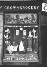 Ettles Crown Grocery, Inverness December 1927.  Window display for Skippers tinned fish, an entrant in the John Bull's Great National Window Display competition. Now Chris Crook Hairdressers on the corner of Charles Street, Inverness.* 
