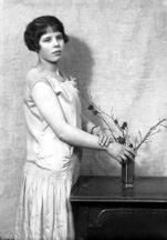 Young woman standing. #