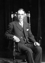 Man seated in chair. #