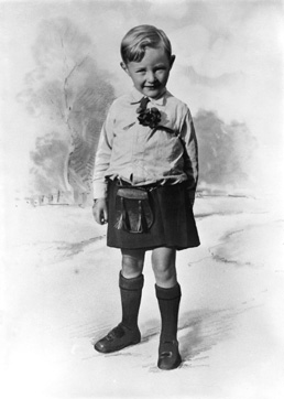 Boy in kilt with hand-drawn background.#