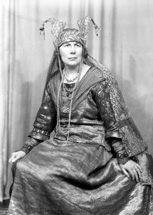 Actress Nelly Hutin Britton was born on 24th April 1876 in Bucklebury, Berkshire. Famous for her Shakespearean roles, she debuted in 1901 in 'Henry V.' She also played Hero in 'Much Ado About Nothing' (1903), Ophelia in 'Hamlet' (1909), Lady Elizabeth in 'Richard III' (1909) and Lady Macbeth at Stratford (1911). In 1903 she married famous actor Matheson Lang, and thereafter they appeared together frequently on stage and later on film. In 1906 she played Arganthael in 'Tristram and Iseult' at the Adelphi Theatre, with Lang as Tristram. Britton and Lang subsequently formed their own company, which toured India, South Africa and Australia from 1910-13 performing Shakespeare. Her roles included Katherine in 'The Taming of the Shrew,' Portia in 'The Merchant of Venice,' Juliet in 'Romeo and Juliet,' as well as reprising the roles of Ophelia and Lady Macbeth. She also appeared with Lang in 'Mr Wu,' which became his signature role. In 1916 they appeared together in a silent film of 'The Merchant of Venice' in which she once again played Portia. She also joined her husband in the film 'The Wandering Jew' (1923) playing the part of Judith. After a four-year illness and a temporary retirement, she returned to the Old Vic stage in 1923 for the Shakespeare Birthday Festival and the following year as Volumnia in 'Coriolanus,' and continued to act until she retired in 1936. In 1940 the Langs were staying with their old friend Dornford Yates and his wife at their house near Pau in France when France surrendered, and they had to escape from the advancing Germans through Spain to Portugal. In later life she sat on the governing board of the Old Vic Theatre. She died on 3rd September 1965 aged 89. These promotional shots were probably taken for the Inverness performance of 'The Wandering Jew' in October 1936, which played to a packed house for several days at the Empire Theatre.