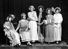 Captioned 'April Showers,' possibly from a theatre production. #