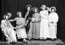 Captioned 'April Showers,' possibly from a theatre production. #