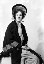 Captioned 'April Showers,' possibly from a theatre production. #