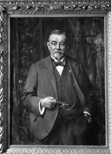 Unidentified male painted portrait in frame.# 