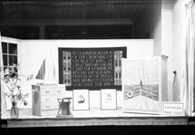 Mr MacAvoy's show window for the May 1937 Coronation of King George VI, complete with portraits of the Princesses Elizabeth and Margaret, and sailing motifs.* 