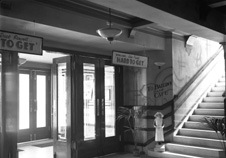 Palace Cinema foyer, Huntly Street, Inverness. Opened 21st November 1938 with 'Hard to Get' starring Dick Powell, after a ceremony performed by Provost Hugh Mackenzie. The nurse figurine in the foyer is a charity collection box in aid of the Royal Northern Infirmary. The Palace once seated 1,023 patrons. It closed in 1963 and became a bingo hall until it was finally demolished in 2010. *