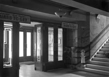 Palace Cinema foyer, Huntly Street, Inverness. Opened 21st November 1938 with 'Hard to Get' starring Dick Powell, after a ceremony performed by Provost Hugh Mackenzie. The nurse figurine in the foyer is a charity collection box in aid of the Royal Northern Infirmary. The Palace once seated 1,023 patrons. It closed in 1963 and became a bingo hall until it was finally demolished in 2010. * 