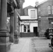 Macrae & Dick Taxi Booking Office in Station Square, the site now occupied by Mail Boxes Etc., with Ben Wyvis Kilts upstairs. The train station building is on the right.*