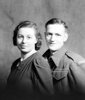 Mrs Weir, Nairn. He wears a 'Canada' arm patch on left sleeve.