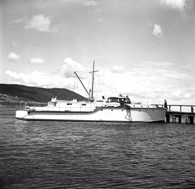 Jack Baxter. Polaris. February 1964. What appears to be a renovated WWII-period motor torpedo boat in Thornbush Quay, Anderson Street, Inverness. *