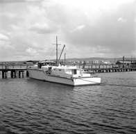 Jack Baxter. Polaris. February 1964. What appears to be a renovated WWII-period motor torpedo boat in Thornbush Quay, Anderson Street, Inverness. *