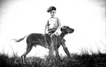 Andrew Chalmers with his pet dog. He was a grandson of the famous photographer Andrew Paterson (1877-1948).