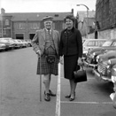 Caption states 'Betty with grandpa Matheson.' In the car park of what is now Farraline Park Bus Station, Inverness.