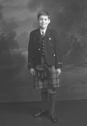 Andrew Chalmers dressed in school uniform for Sundays at the Loretto Boarding School, Edinburgh. (see also refs: 33898, 39550 and 45474). He was a grandson of the famous photographer Andrew Paterson (1877-1948).