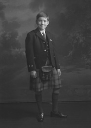 Andrew Chalmers dressed in school uniform for Sundays at the Loretto Boarding School, Edinburgh. (see also refs: 33898, 39550 and 45474). He was a grandson of the famous photographer Andrew Paterson (1877-1948).