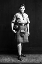 James Grant, probably a member of 3rd Inverness (Crown) Scout Troop. He is wearing a badge dated 1958 (for the Patrol Jamborette held at Blair Atholl in that year), and the other badges he is wearing indicate he was well through the Scout training programme. In his hat he has the badges which indicate that he was a patrol leader.