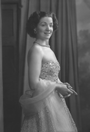 Miss Cairns, Station Hotel, Inverness, in ball gown, standing. Other images also under code 42904.