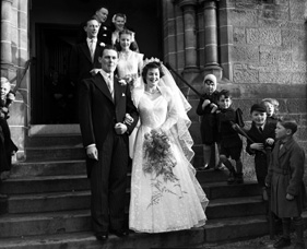 Davidson, The Sheiling, Ardrishaig, Lochgilphead, (6 Glenburn Road). Bridal. January 1953. Outside Crown Church with Crown School pupils looking on. 