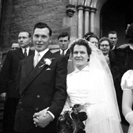 Mr & Mrs Angus MacLeod outside the St. Columba High Church, Bank Street, Inverness, now the CityLife Church. 