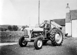 Man on a tractor. #