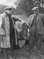 Two men near felled tree. (copy).#   