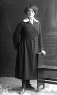 Woman standing c.1922. #