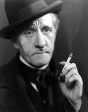 Frederick Charles Hannen Swaffer (1879-1962) was a British journalist and drama critic. He joined the Daily Mail in 1902, was editor of Weekly Dispatch and helped develop the Daily Mirror into a popular newspaper. In 1913, he initiated 'Mr Gossip' for the Daily Sketch. He also started 'Mr London' for the Daily Graphic. He was editor of The People, and in 1926 became drama critic of the Daily Express. He joined the Daily Herald in 1931. In the 1930s Swaffer led a spiritualist home circle, following the teachings of the native-American spirit 'Silver Birch,' which were published by A. W. Austen in 1938. Hannen Swaffer was a socialist, but resigned form the Labour Party in 1957. He also became a spiritualist. He is said to have written almost a million words each year. Swaffer appeared in the films 'Death at Broadcasting House' (1934), 'Late Extra' (1935) and 'Spellbound' (1941). He also appeared on The Brains Trust programme. He died in London in 1962. Courtesy John and Aithne Barron.    