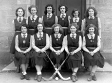 Hockey 1st XI  1948-1949. Rear: Lorna Menzies (VC), Vaila MacLeod, Margaret MacLennan (P), Isobyl Bauchop, Maisie Forsyth, Alice MacLeod. Front: Adela Fuchsova, Erica Donald (P), Aileen Barr (SC), Peggy MacLeod (P), Deirdre Munro (P). (Courtesy Inverness Royal Academy Archive IRAA_010).