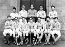 Shinty 1946-1947. Team members were: Kenneth M. MacRae, John M. MacDougall, A.A. MacKintosh, Sammy MacDonald, Alan Douglas, G.A Angus, John M.S Rose, Angus MacGruer, Derick MacKenzie, Evan Hill, Malcolm MacVicar, Stanley D. Fleming. (Courtesy Inverness Royal Academy Archive IRAA_019).