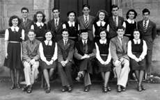 Inverness Royal Academy Prefects 1946-1947. Rear: Betty Martin, Hugh Williamson, Effie MacIntyre, John Martin, Christabel Donald, Alistair Fraser, Alison MacNair, Gordon MacKenzie, Muriel Thompson, Alan Douglas. Front: Peter Cameron, Catherine Tulloch, Donald Oliver, Rector D.J MacDonald, Netta Robertson, Murdo Christie, Rhoda Cameron. (Courtesy Inverness Royal Academy Archive IRAA_046).